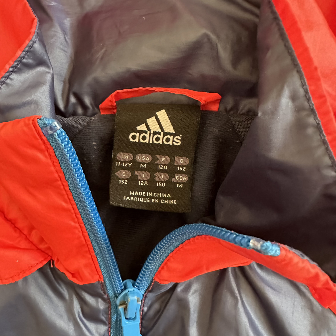 adidas 裏地付きジャンパー ウインドブレーカー 取り外しフード付き 150 オレンジの写真3枚目