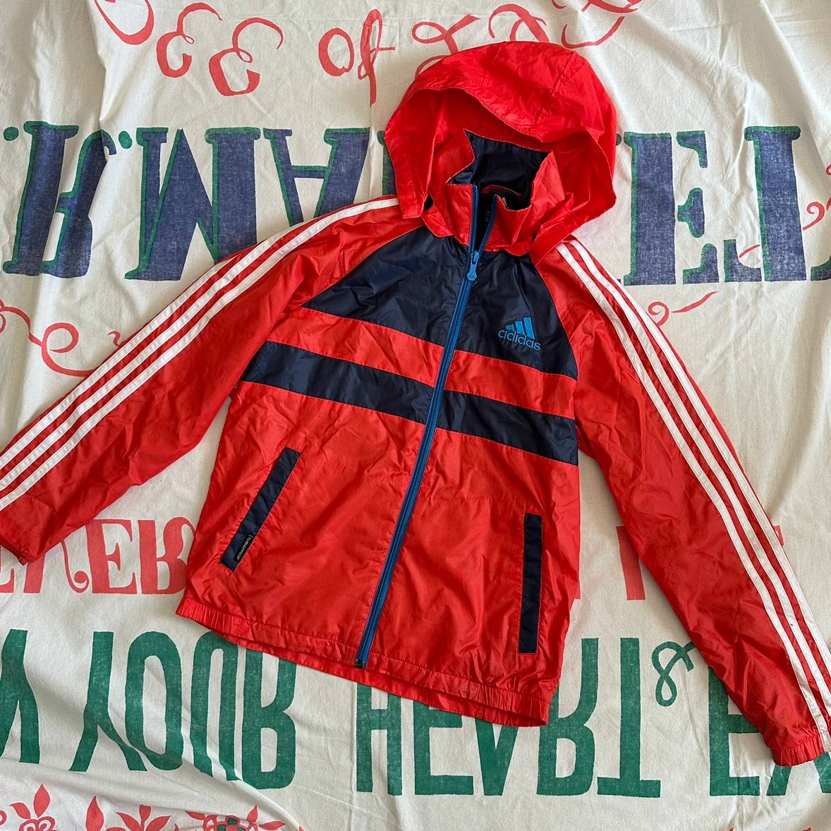 adidas 裏地付きジャンパー ウインドブレーカー 取り外しフード付き 150 オレンジ